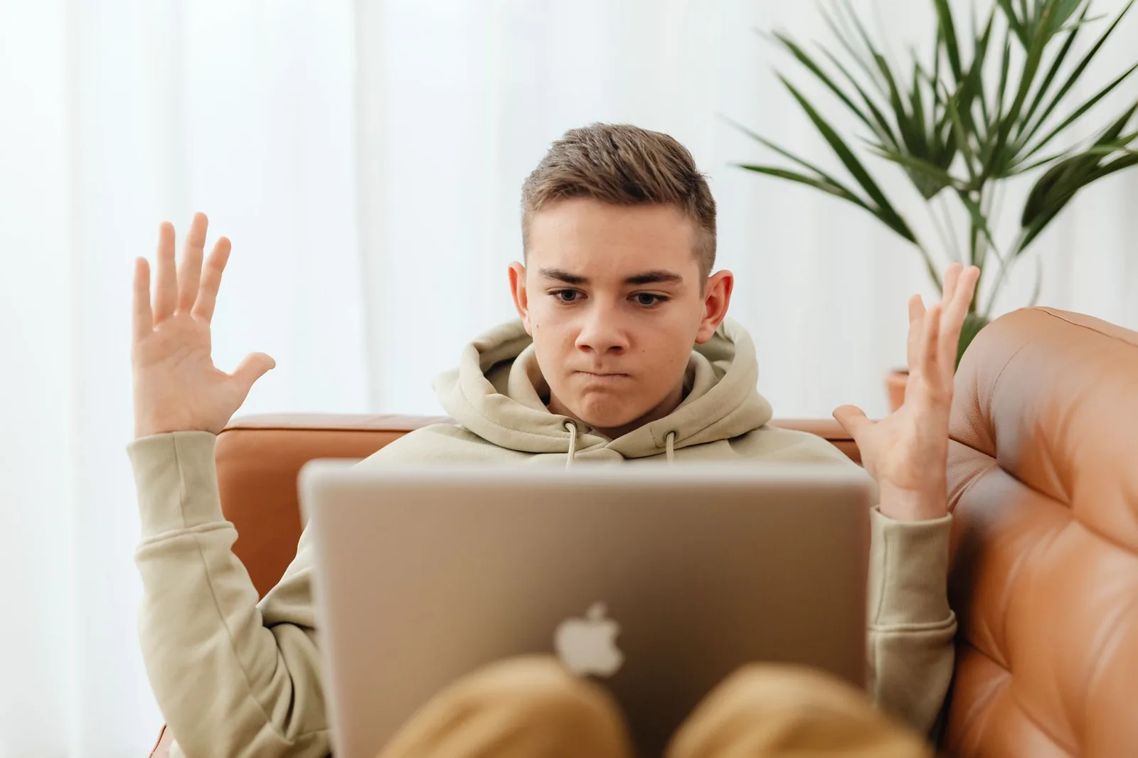 Person at a laptop looking at a busy chatbot answer and wondering how to make ChatGPT show plain text again