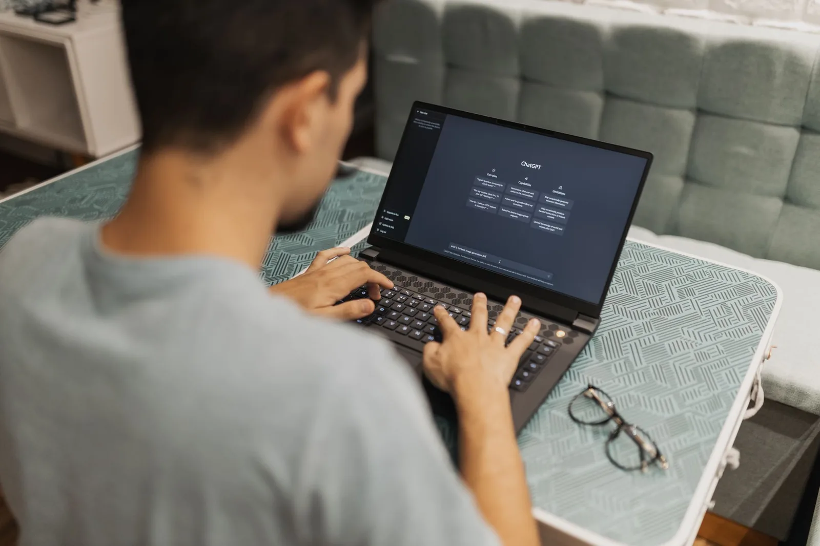 Person using an AI assistant on a laptop
