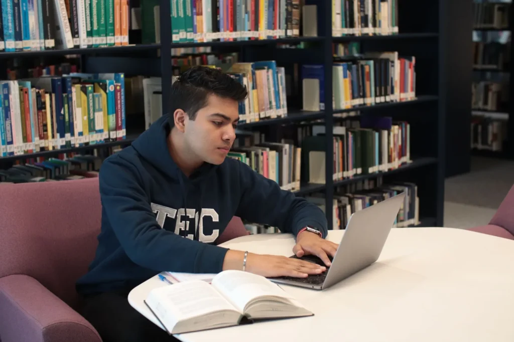 College student using Google AI Pro free on a laptop